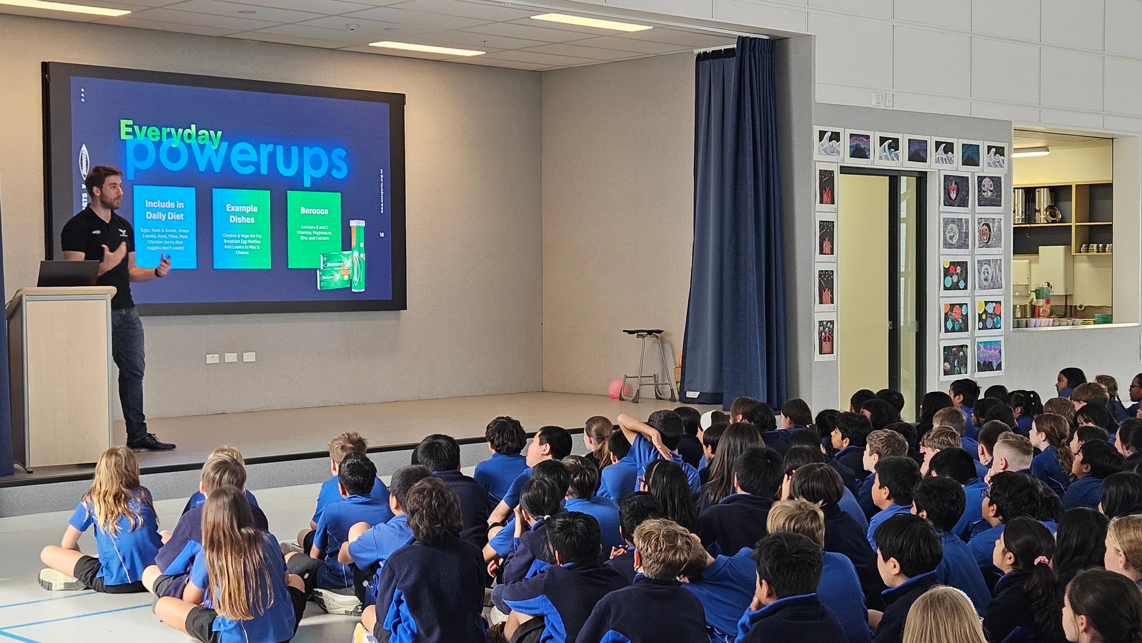 An NZ Esports presenter speaking to students about digital wellbeing
